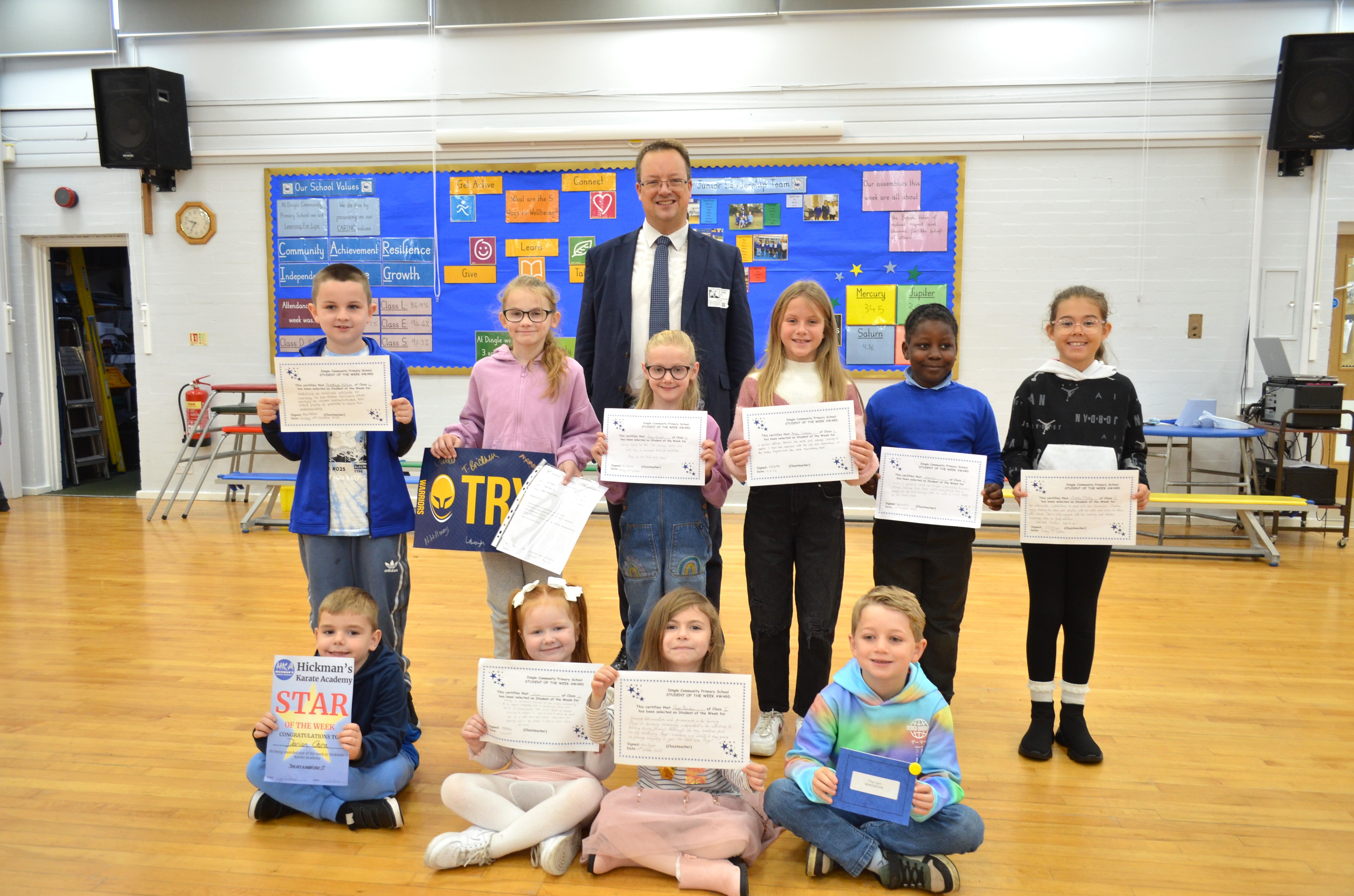 Mike with Praise Assembly winners at Dingle Community Primary School