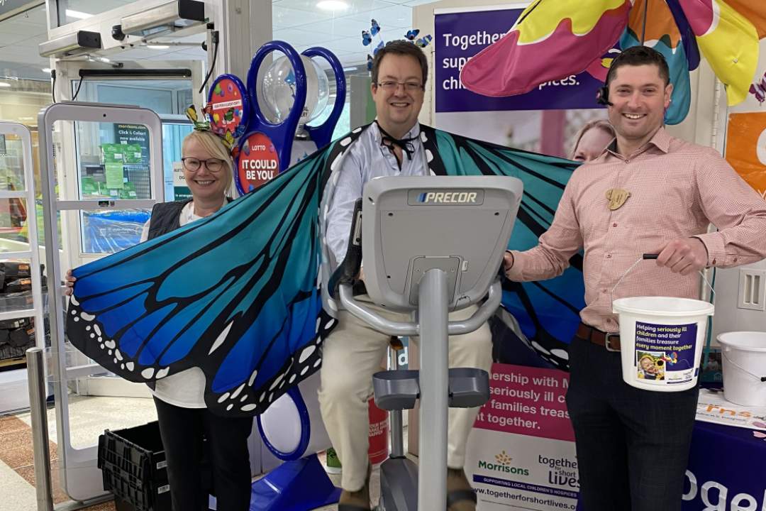 Mike Wood MP on the exercise bike at Morrisons Kingswinford to raise money for Together for Short Lives